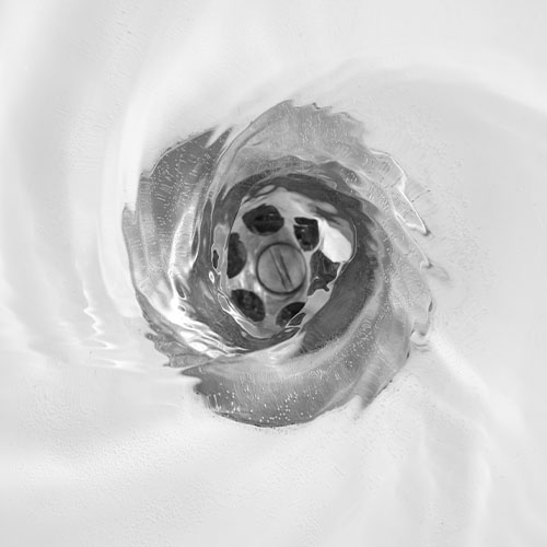 Sink draining water