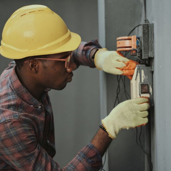 person installing electrical system