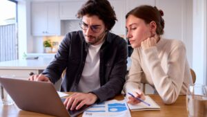 Two people reviewing their water bill