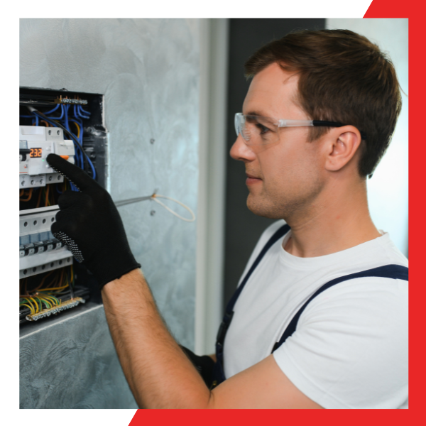 electrician working on panel