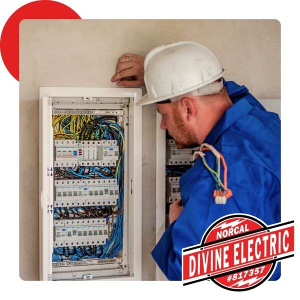 electrician checking home electrical panel compliance