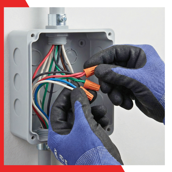 Close-up of professional internal wiring for a hardwired Tesla wall connector installation in San Rafael.