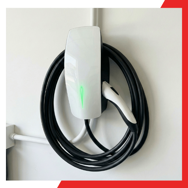 A sleek Tesla wall connector installer San Rafael project showing the charger mounted with cable management.